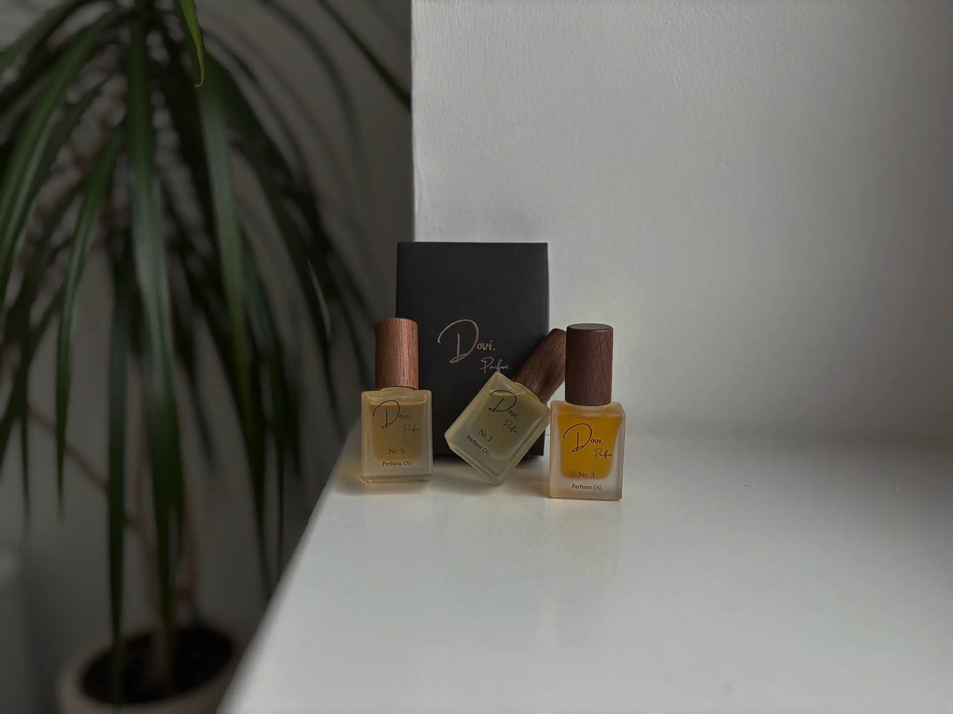 Oil perfume bottles on a shelf